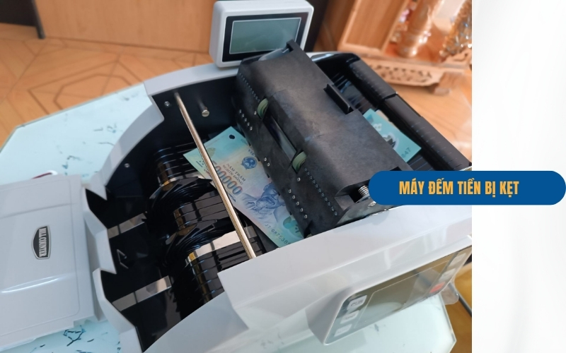 Máy đếm tiền bị kẹt